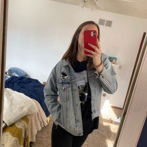 Oversized light wash distressed Levi's jean jacket
